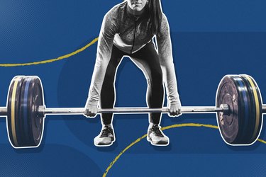 black and white photo of woman grabbing barbell with weight plates on blue background
