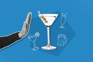 Hand rejecting martini with olives mixed media image